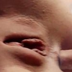 Female orgasm from anal sex. Close up