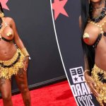 See Summer Walkers barely-there BET Awards 2022 red carpet outfit