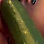 Amelia fucks a cucumber and squirts everywhere