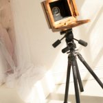 Large Format Camera Pointed at Nude
