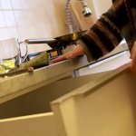 Hot wife cooking nude in the kitchen