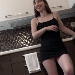 Sexy and Horny Braless Brunette Petite Girlfriend in the Kitchen in a Very Tight Dress to flash pussy and ass